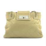 CHANEL - A beige cream shopper handbag