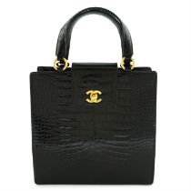 CHANEL - A black crocodile top handle handbag