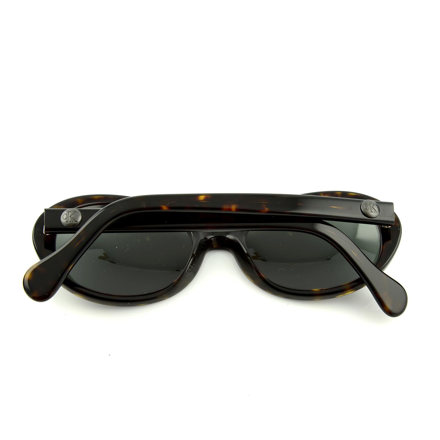 CALVIN KLEIN- a pair of sunglasses. - Image 2 of 3