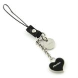 PRADA- an enamel heart keychain.