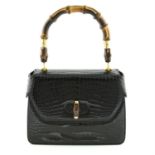 GUCCI - A crocodile, black bamboo handbag