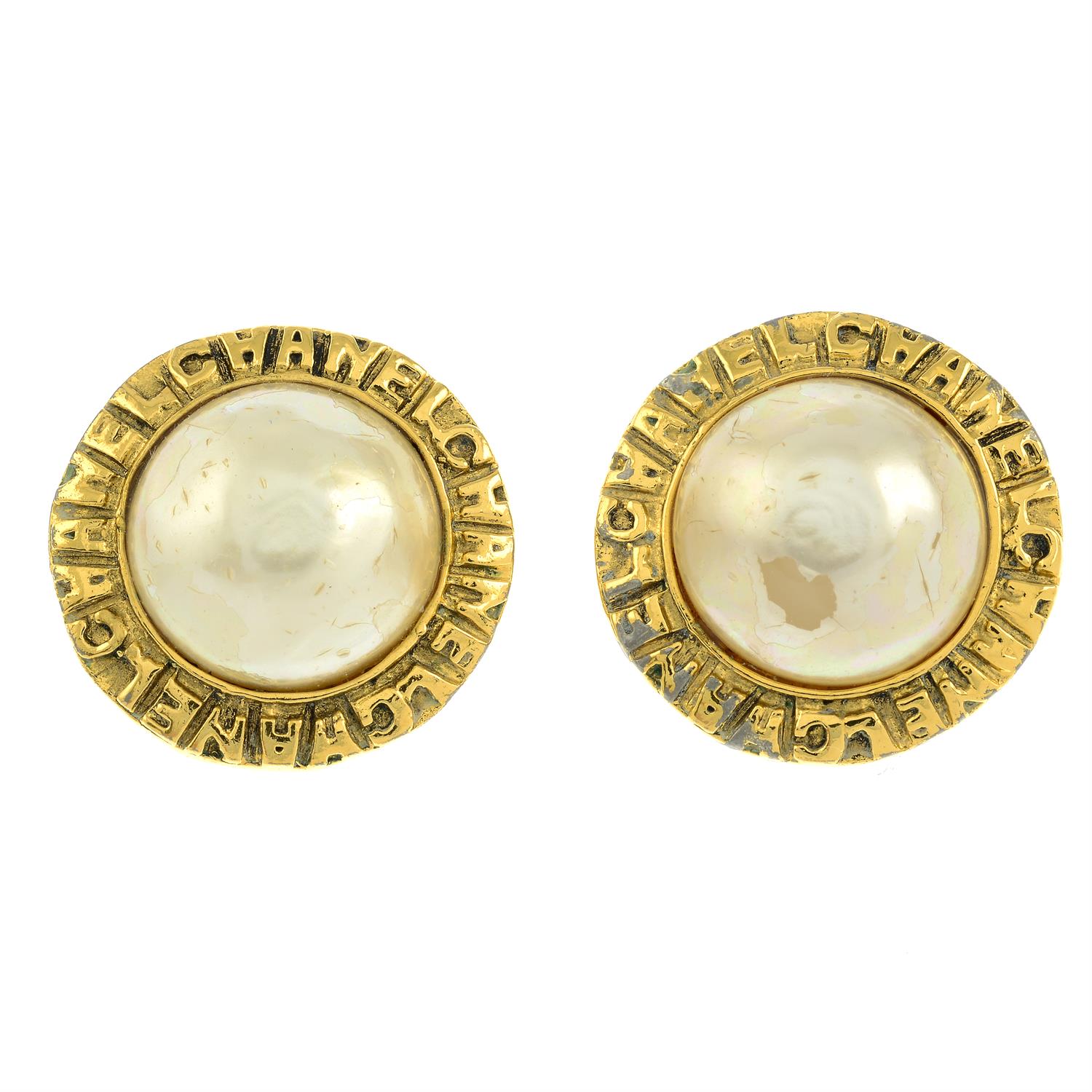 CHANEL - a pair of imitation circular-shape clip-on earrings.