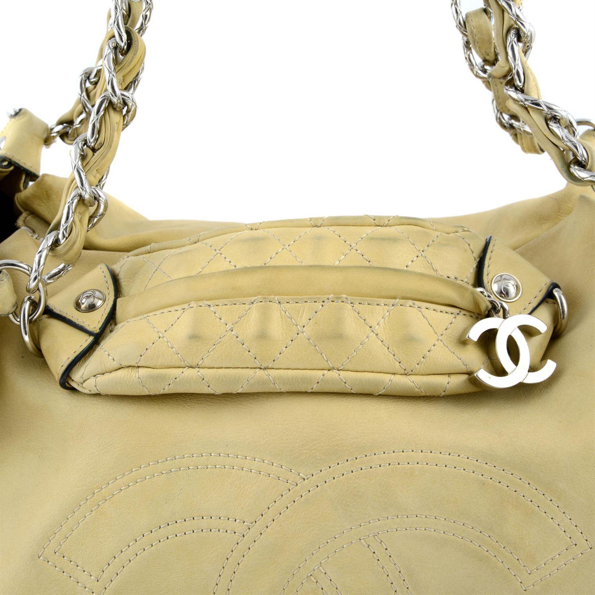 CHANEL - a beige hobo handbag. - Image 2 of 6