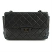 CHANEL - a leather single flap handbag.