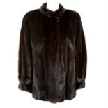 A brown stranded mink fur jacket.