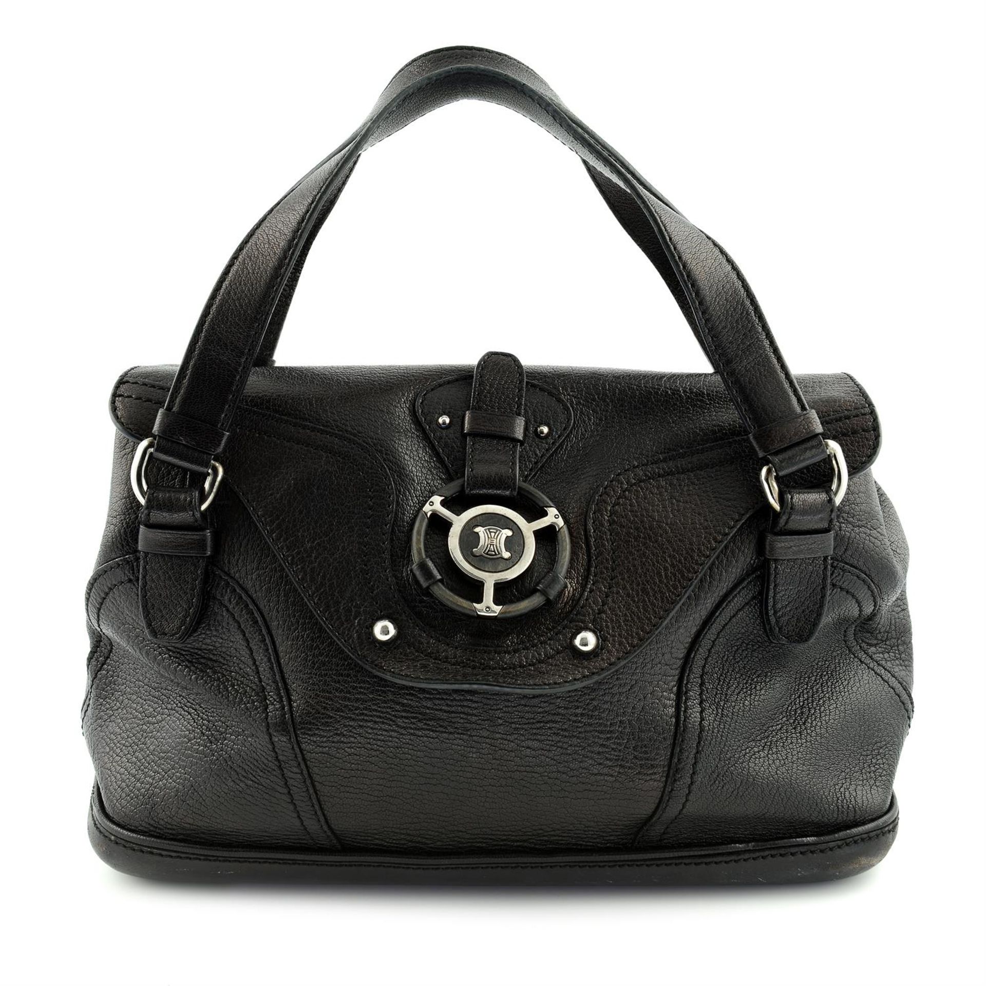 CÉLINE - a black leather handbag.