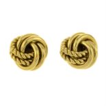 GIVENCHY - A pair of knot clip-on earrings.