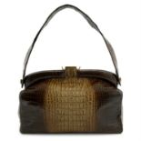 A 1940s/50s crocodile handbag.