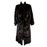 A long black mink fur coat.