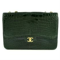 CHANEL - a green alligator Jumbo classic flap handbag.