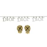 CHRISTIAN DIOR - a logo charm bracelet and a pair of clip-on earrings.