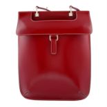 JAEGER - a red leather satchel.