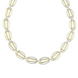 GIVENCHY - a two-tone geometric necklace.