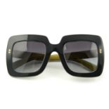 DOLCE & GABBANA- a pair of sunglasses.