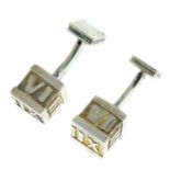 TIFFANY & CO - a pair of 'Atlas' cube cufflinks.