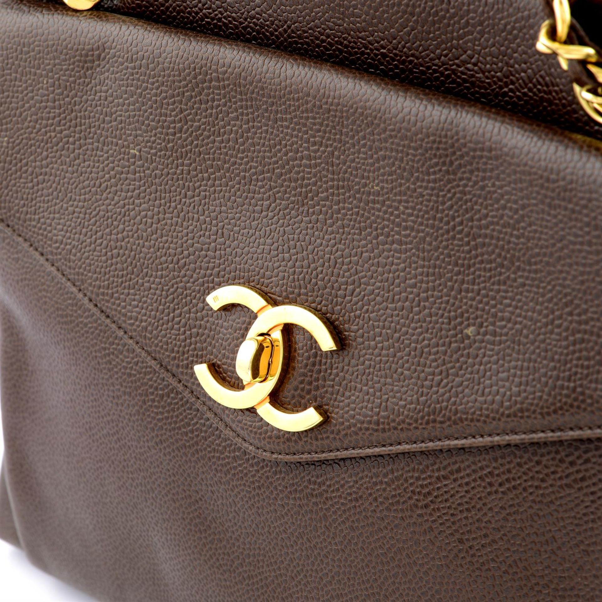 CHANEL - a vintage brown caviar leather handbag. - Image 6 of 6