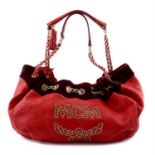 MCM - a red leather studded Munchen handbag.