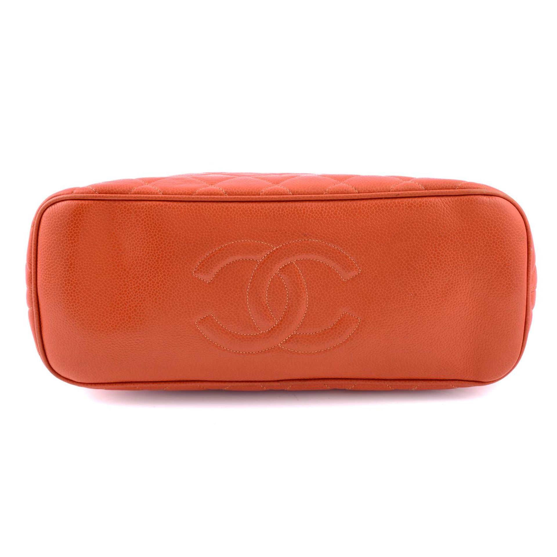 CHANEL - an orange caviar leather handbag. - Image 5 of 5