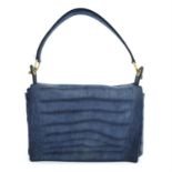 YVES SAINT LAURENT- a blue suede bag.