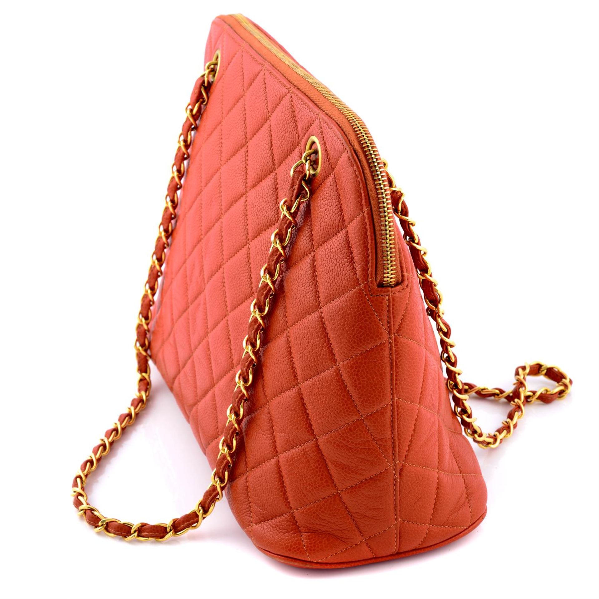 CHANEL - an orange caviar leather handbag. - Image 4 of 5