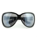 CHRISTIAN DIOR- a pair of oversized frame sunglasses.