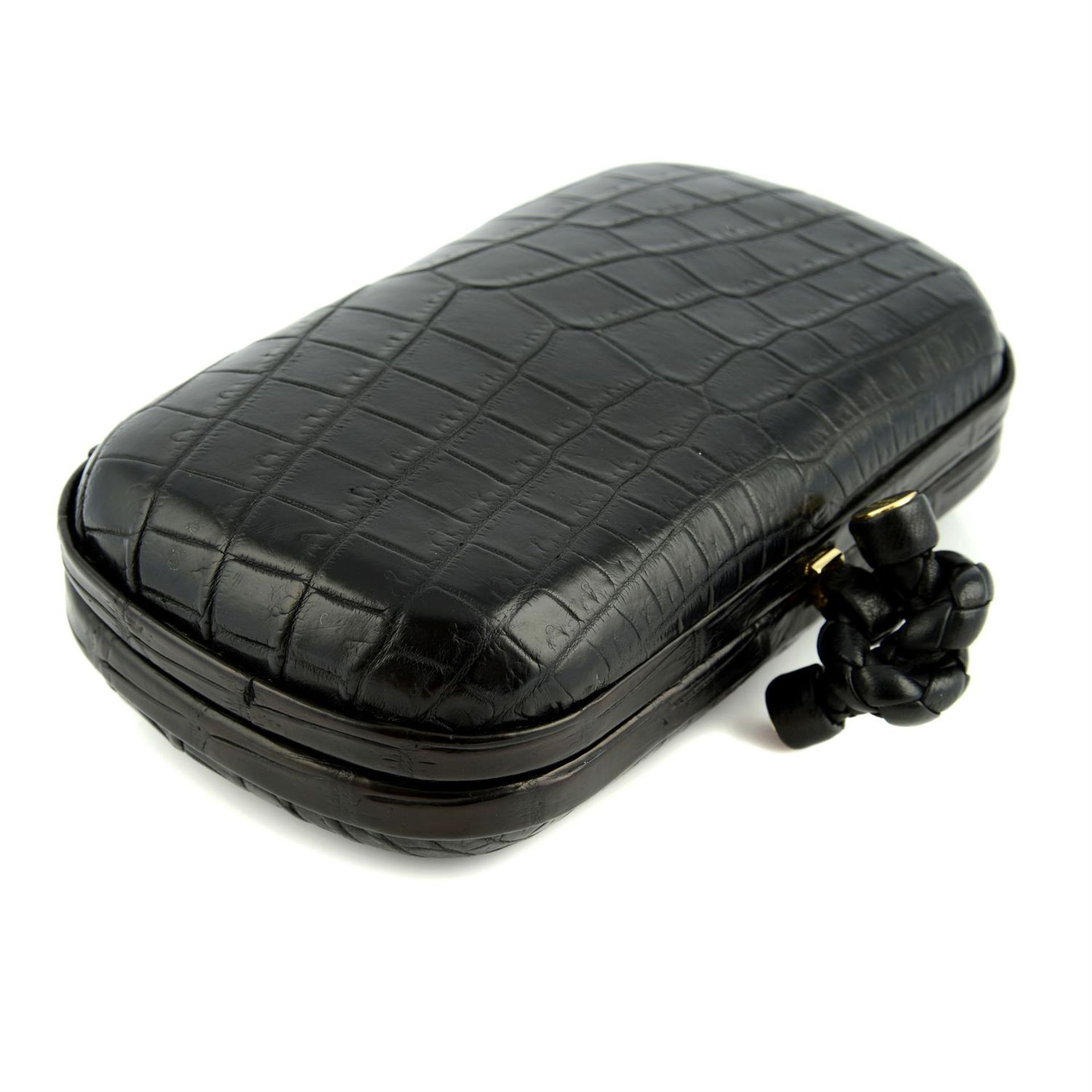 BOTTEGA VENETA- a black crocodile knot clutch bag. - Image 3 of 4