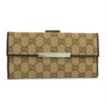 GUCCI: Two Gucci wallets
