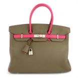 HERMÈS - a 2009 taupe and fuchsia Birkin 35 handbag.