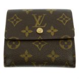 LOUIS VUITTON- a monogram canvas wallet.