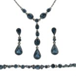 GIVENCHY - a blue paste jewellery set, to include a necklace, bracelet and earrings.