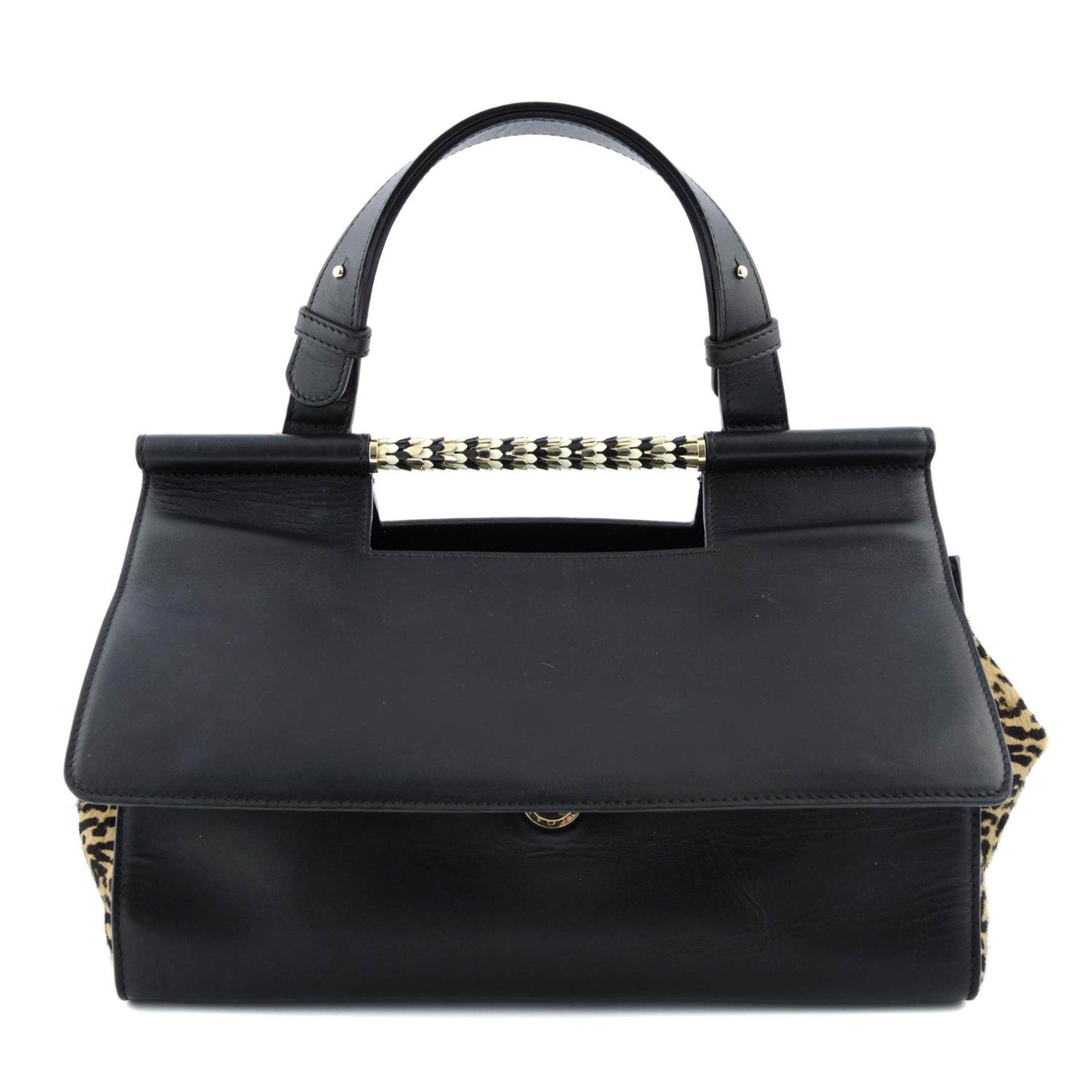 BULGARI - a black leather Serpenti handbag.