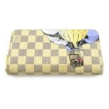 LOUIS VUITTON - a Limited Edition Damier Azur Canvas Illustre Zippy wallet.