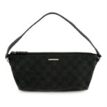 GUCCI- a black monogram bag.