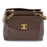 CHANEL - a vintage brown caviar leather handbag.