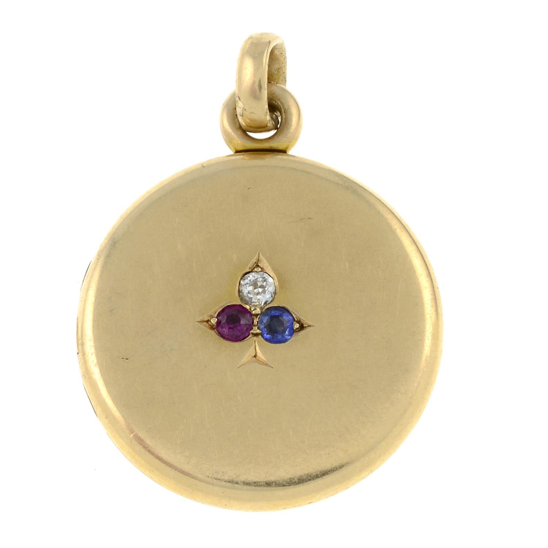 An early 20th century gold diamond, ruby and sapphire locket, depicting a shamrock.