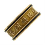 A Georgian 18ct gold and black enamel mourning ring.