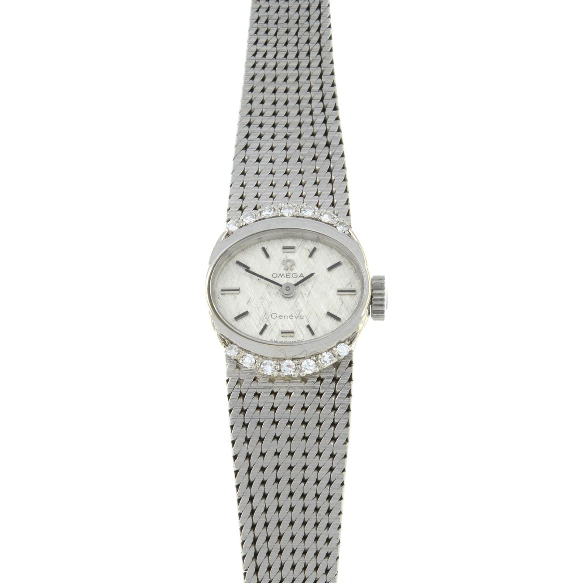 A lady's 18ct gold wrist watch, with single-cut diamond bezel, by Omega.