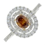An 18ct gold 'brown' diamond and diamond dress ring.