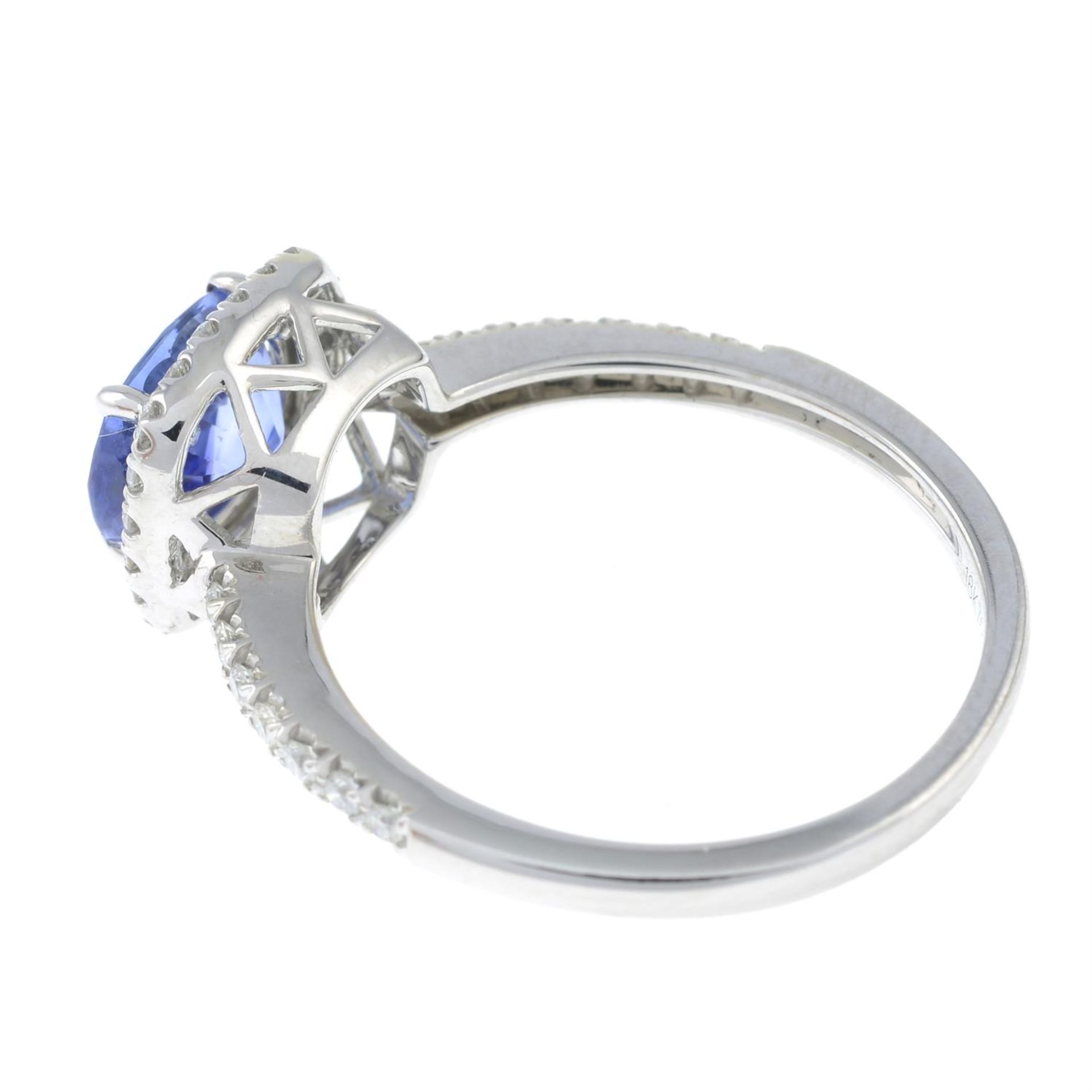 A sapphire and brilliant-cut diamond cluster ring. - Image 2 of 2