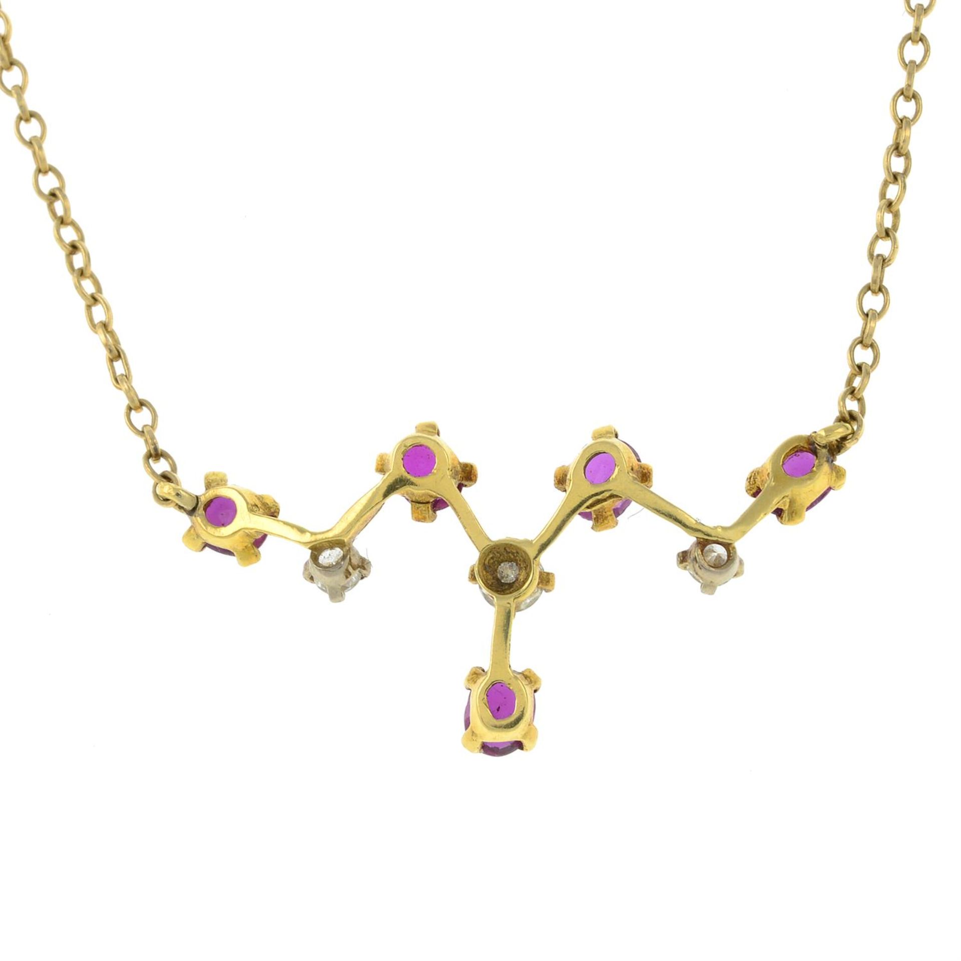 A ruby and diamond chevron pendant, on a 9ct gold integral trace-link chain. - Image 2 of 3
