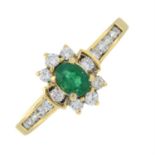 An 18ct gold emerald and brilliant-cut diamond cluster ring.