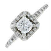 A platinum square-shape and brilliant-cut diamond cluster ring.