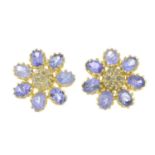 A pair of tanzanite and diamond floral cluster earrings.