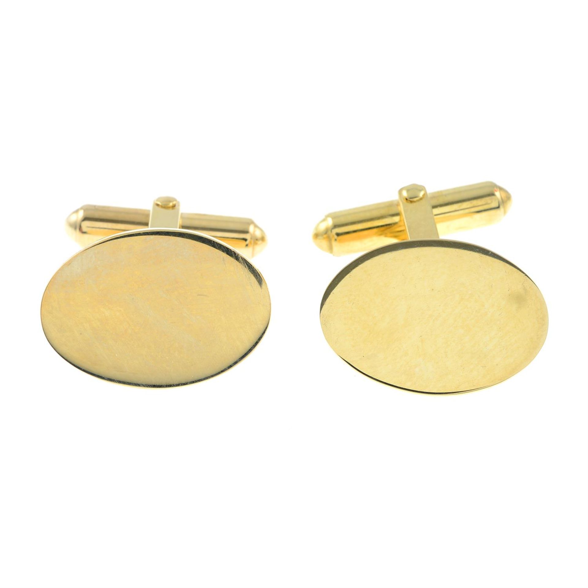 A pair of 9ct gold oval cufflinks.