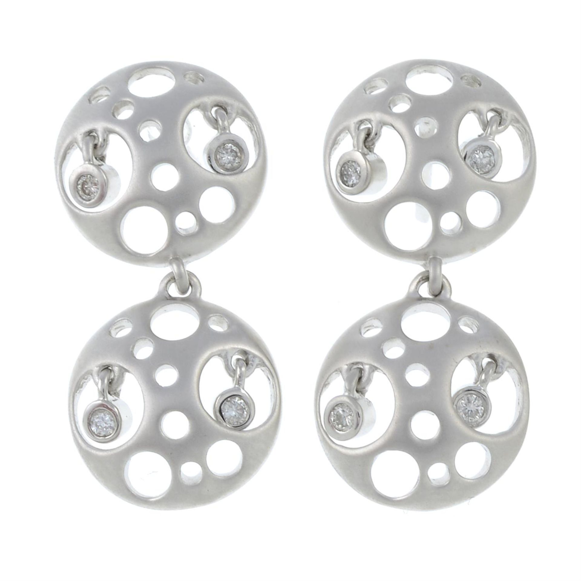 A pair of drop earrings, with diamond accents.