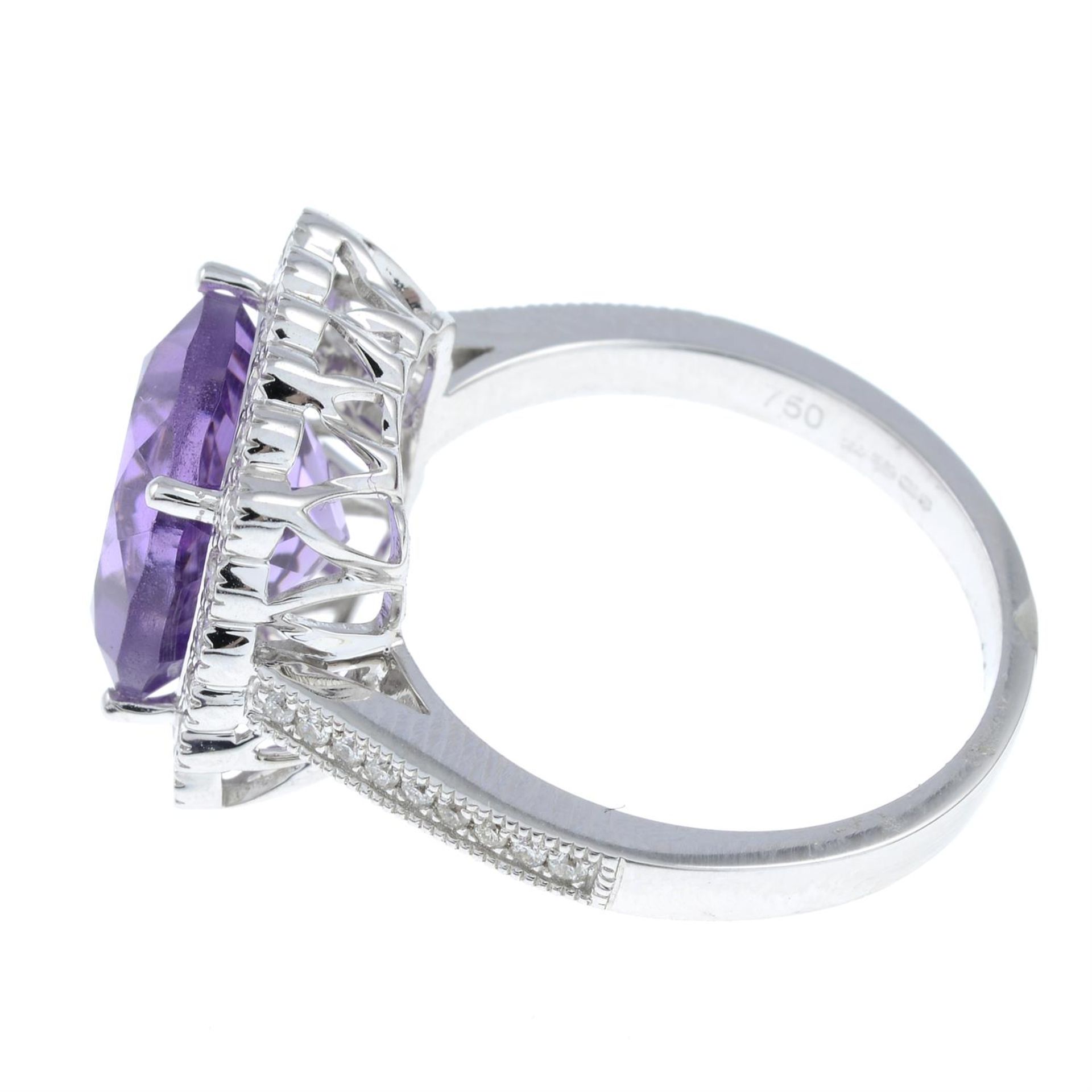 An 18ct gold amethyst and diamond cluster ring. - Image 2 of 3
