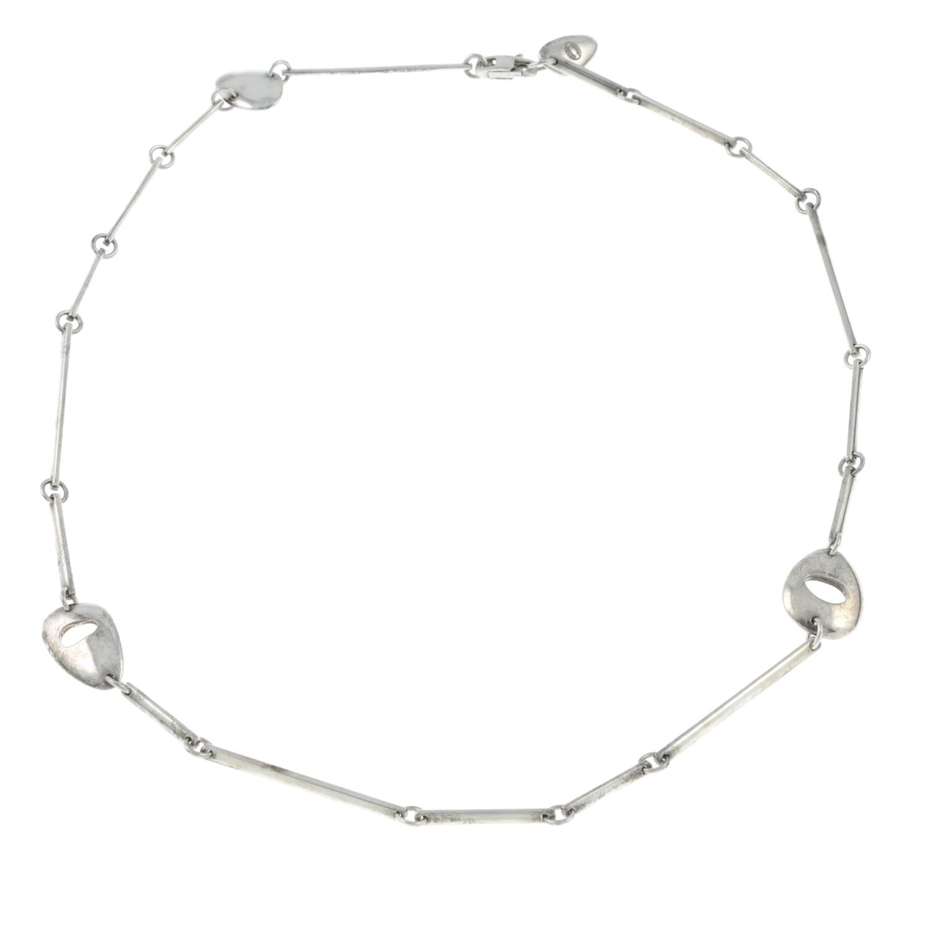 A silver 'Pebbles' necklace, by Lina Falksgaard for Georg Jensen.