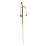 An early 20th century gold riding spur stickpin.