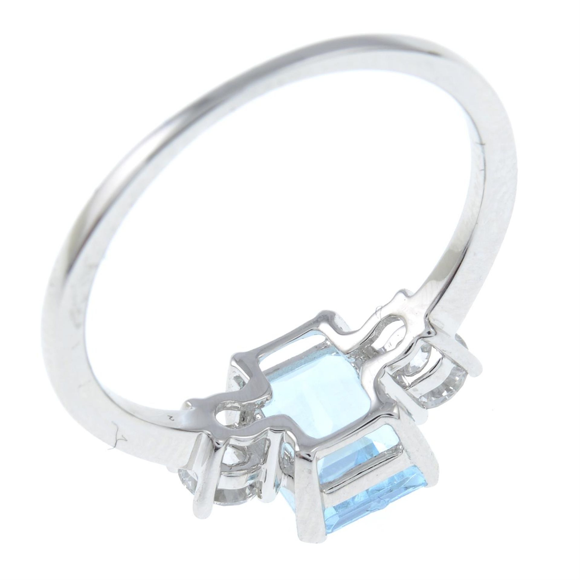 An 18ct gold aquamarine and diamond three-stone ring. - Image 3 of 3