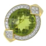 An 18ct gold peridot and diamond dress ring.